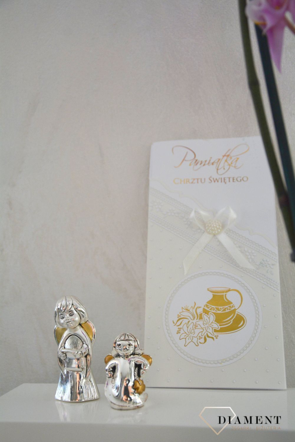 Figurka srebrna Aniołek z koniczynką na szczęście..jpg